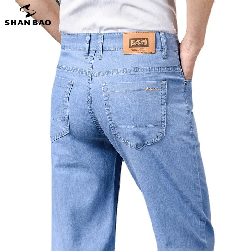 SHAN BAO ฤดูร้อนผู้ชายตรงหลวมน้ำหนักเบากางเกงยีนส์คุณภาพสูง Lyocell ยืดสบายๆสูงเอวกางเกงยีนส์บาง