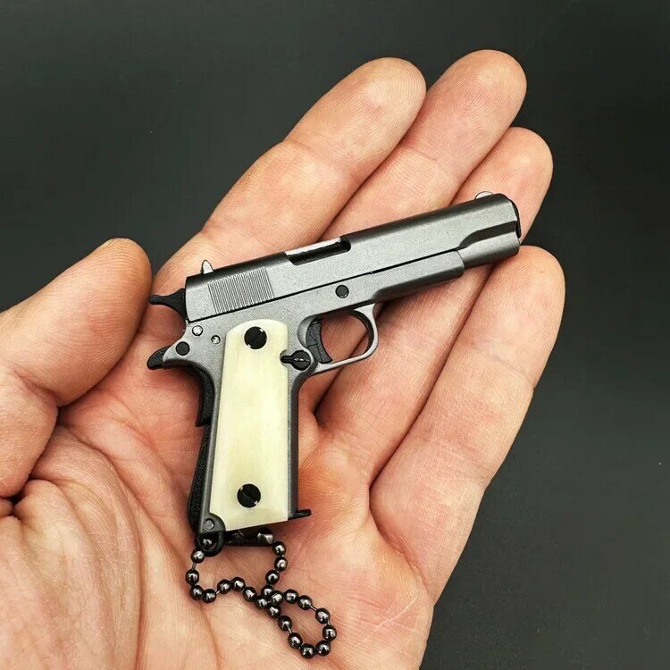 1:3 Colt 1911 Rinder Knochen griff Pistole Pistole Miniatur Modell Legierung Schlüssel bund Geschenk Rucksack Anhänger Dekoration Junge Geschenke Spielzeug