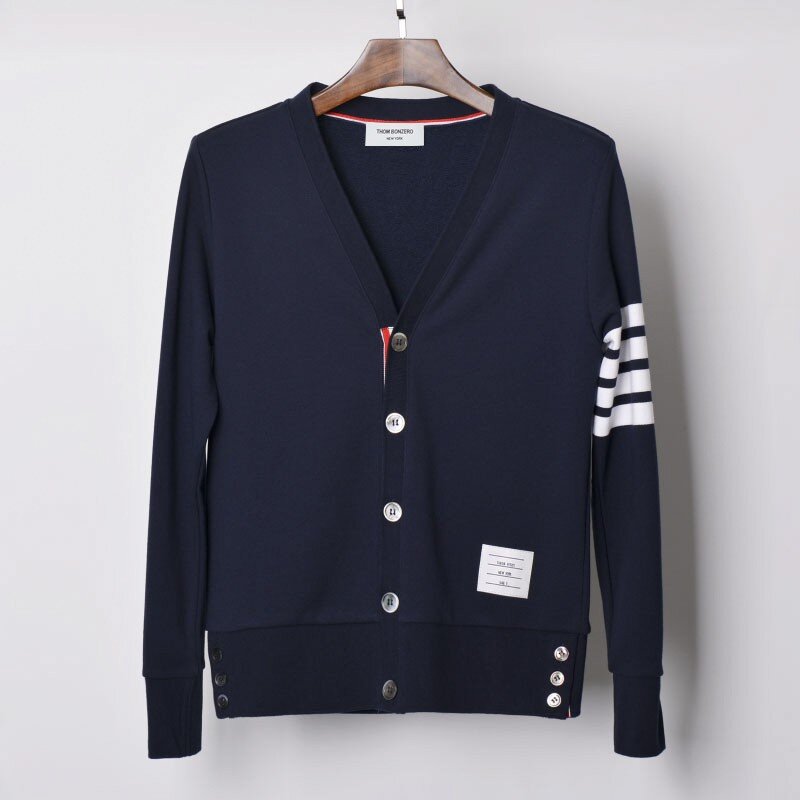 Suéteres de punto para hombres y mujeres, versión de alta gama, venta al por mayor, con botón de concha