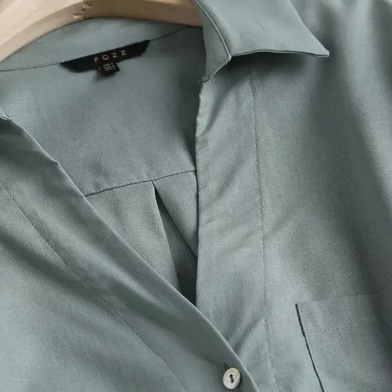 Blusa Retro de manga larga con botones para mujer, blusa holgada de dos colores con decoración de bolsillo, moda 2023