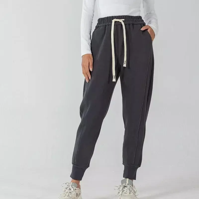 Nuovi pantaloni sportivi con cinturino alla moda pantaloni da Jogging larghi Slim Leggings alla moda pantaloni Casual per le donne