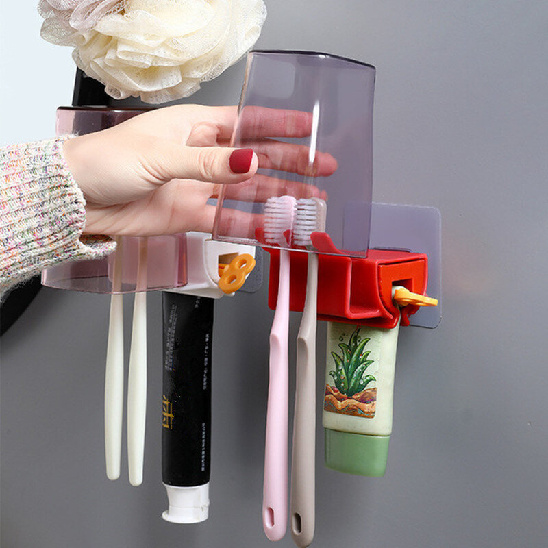 Vendita calda dentifricio in plastica spremiagrumi portaspazzolino Dispenser facile rotolamento forniture per il bagno accessori per la pulizia dei denti