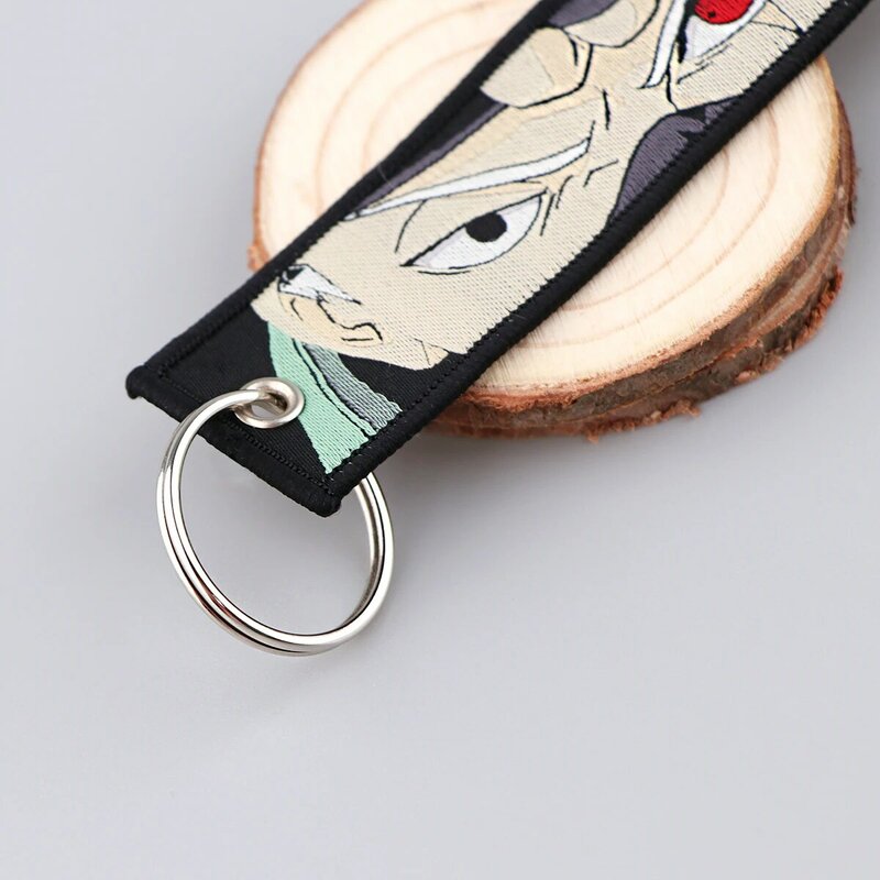 Japońskie Anime haft breloczki kluczowe tagi motocykle plecak Chaveiro brelok do kluczyków samochodowych Mange brelok prezenty dla przyjaciół mody