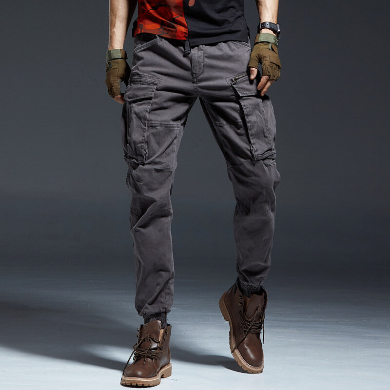 Długie spodnie do biegania Cargo męskie jeansowe bawełniane duże kieszenie elastyczne w talii długie spodnie męskie zimowe grube spodnie taktyczne