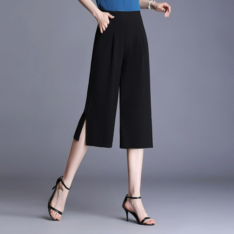 Estate nuovi pantaloni a gamba larga stampati sottili di grandi dimensioni donna tasca coreana elastico a vita alta fiore frammentato moda Capris sciolti