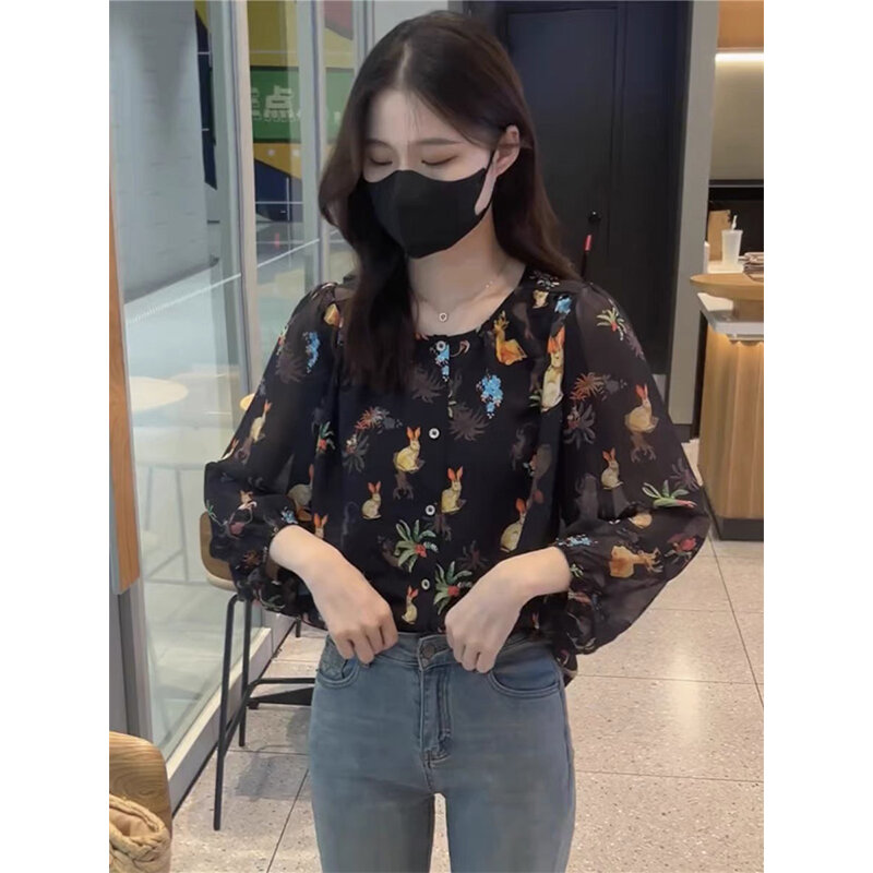 เสื้อสวมหัวแขนยาวคอกลมพิมพ์ลายทรงหลวม MODE Korea สำหรับผู้หญิงเสื้อผ้าผู้หญิงใส่สบายเข้ากับทุกชุดเสื้อแบบบางฤดูใบไม้ผลิ