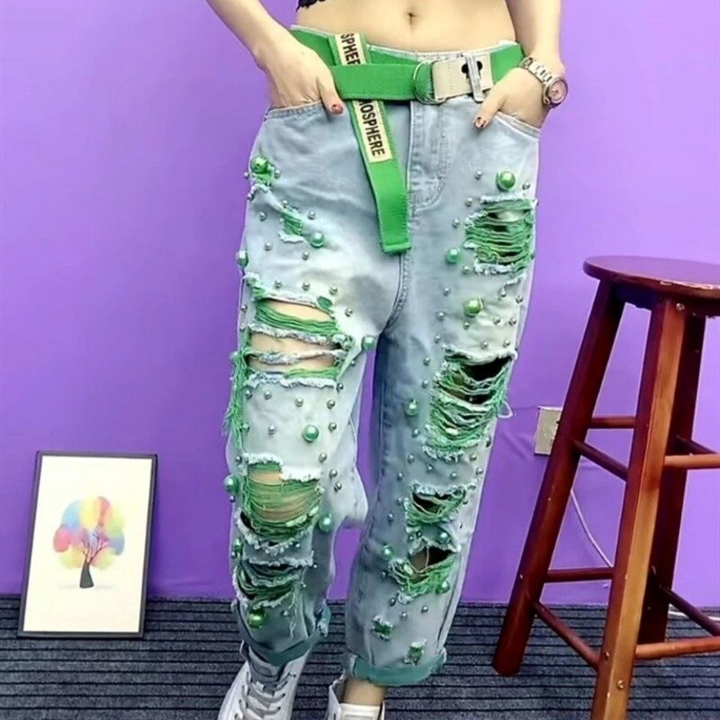 European and American ripped jeans with heavy beading ripped holes and contrasting colors, loose and personalized denim trousers