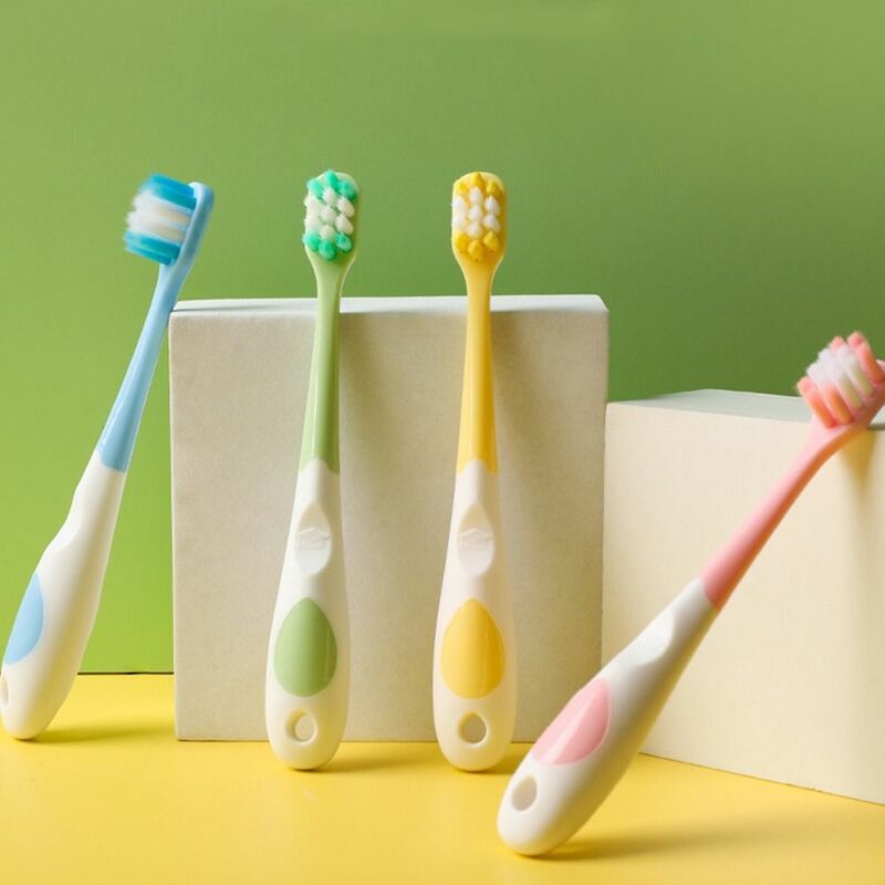 Escova de dentes dos desenhos animados das crianças, cerdas macias, produto comestível, escova de limpeza da boca, Anti Slide Handle, cor sólida
