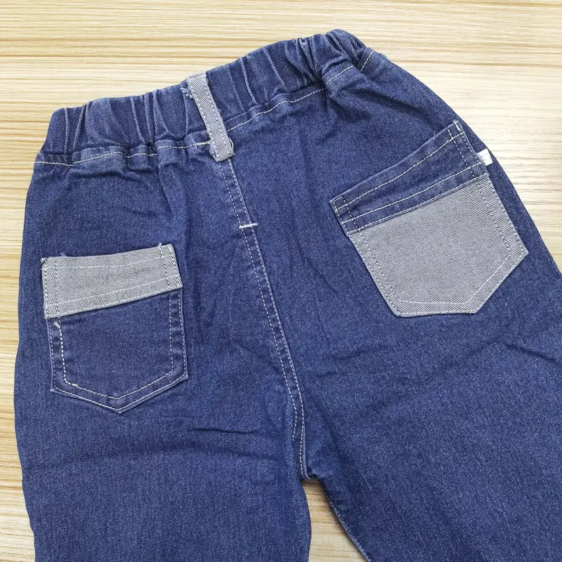 Spodnie jeansowe dla chłopców odzież dziecięca odzież dziecięca wiosna prosto spodnie kowbojskie Casual spodnie 2-6 lat