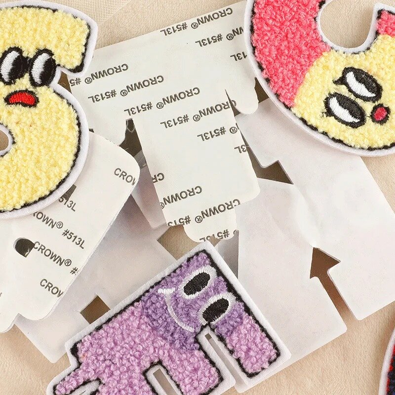 Hot Selling Cartoon Embroidery Patches DIY Monster Letter Cloth Stickers Towel Fabric Self-adhesive Badges Fabric Accessories