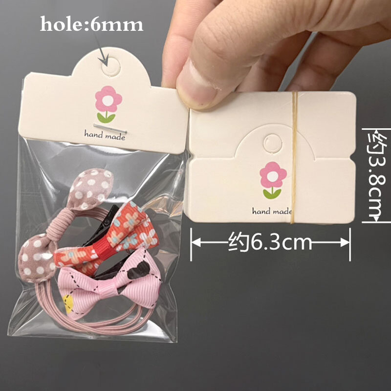 50 teile/los Faltbare Verpackung Papier Karten mit OPP Taschen für Handgemachte Schmuck Einzelhandel Hängen Tag Bogen-knoten Muster Display karton