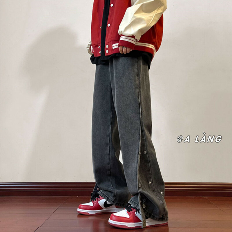 2023 autunno allentato Casual giapponese Streetwear Hip Hop Vintage Jeans strappati pantaloni con bottoni laterali uomo pantaloni in Denim nero maschile
