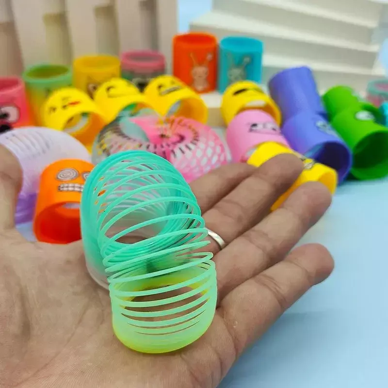 1 buah mainan pegas ajaib senyum plastik pelangi Neon untuk anak-anak pesta ulang tahun hadiah karnaval hadiah baby shower untuk tamu