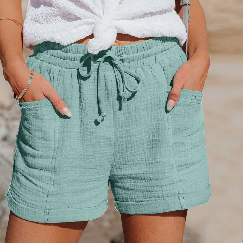 Celana pendek katun kasual wanita, bawahan dasar dasar polos berenda dengan kantong Musim Panas 2024