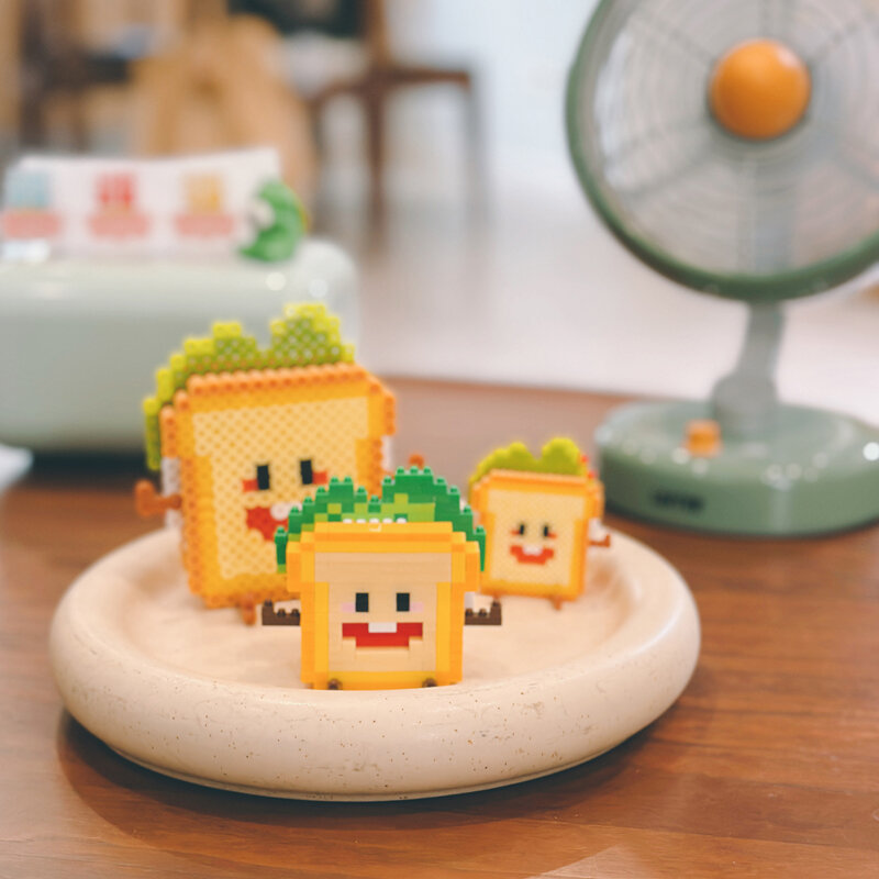 Zabawne klocki mikro-cząsteczkowe Happy Eat and Play Series wibrujące awokado ananasowe zabawki edukacyjne dla dzieci