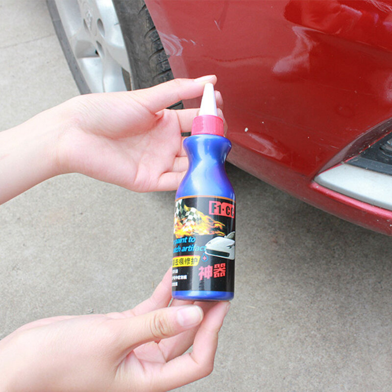Small blue paint brush for car scratch repair solution for removing stains, scratch repair agent, and scratch free wax