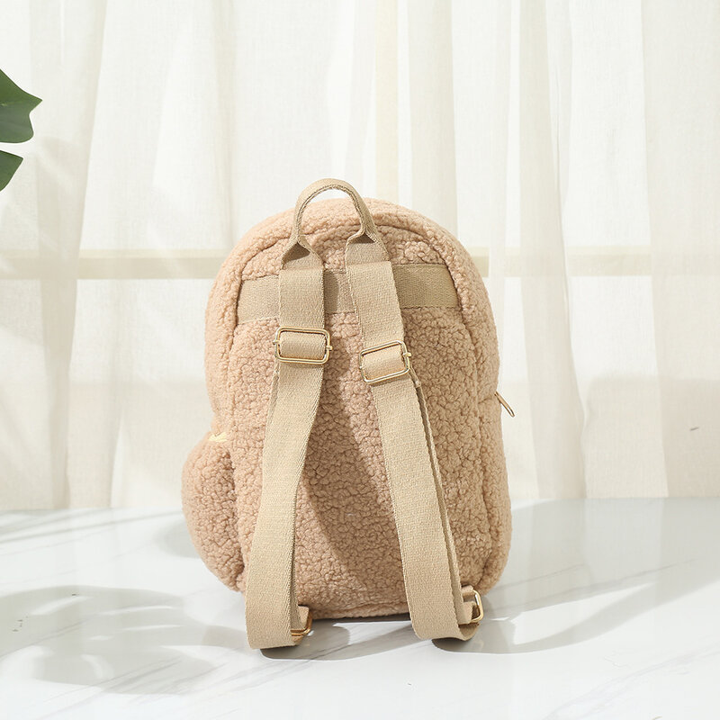 Mochila de lana de cordero versión coreana personalizada para mujer, mochila de felpa de nicho para niños, mochila de dibujos animados