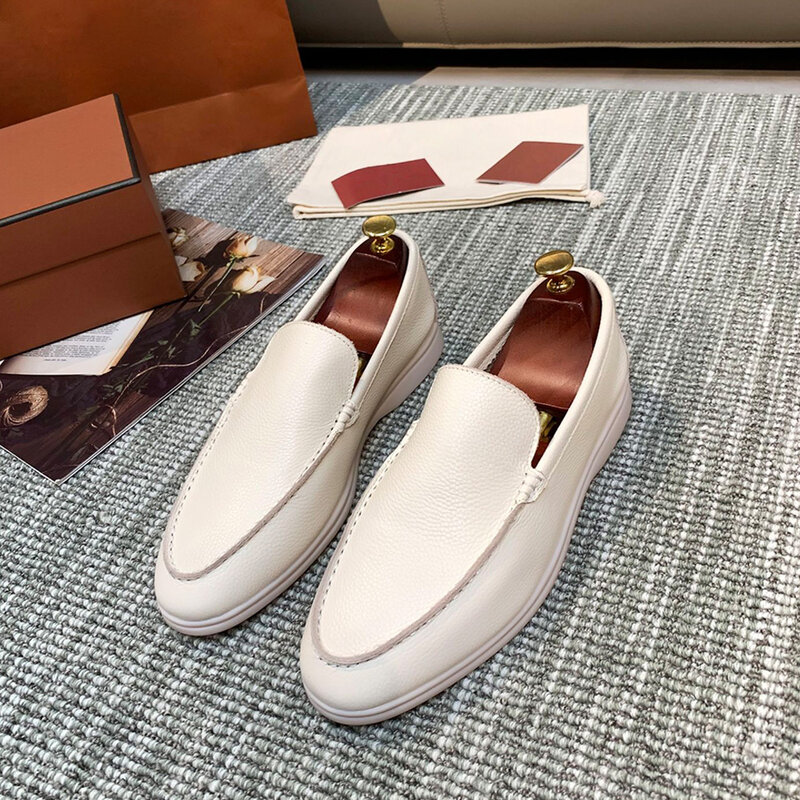 Mocassini di lusso Premium in pelle bovina scarpe Casual da uomo 2023 scarpe da passeggio a fondo piatto in pelle Top scarpe da donna di marca di grandi dimensioni
