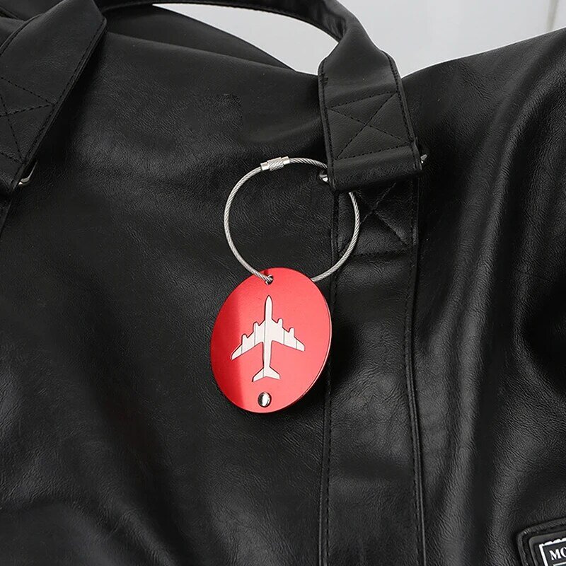 Tag bagasi logam campuran Aluminium terbang Aksesori Perjalanan tas Label portabel Tag asrama pemegang alamat ID koper bulat