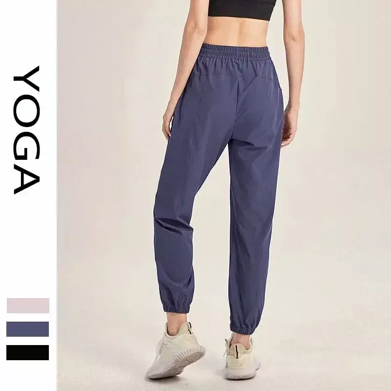 Celana Yoga longgar wanita, bawahan lari Fitness dengan saku, cepat kering