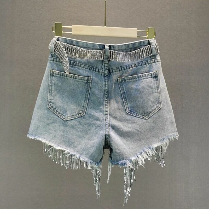 Spodenki jeansowe damskie letnie i koreańskie wersje z wysokim stanem i smukłe z dziurkami wysadzanymi cekinami frędzle spodnie z szerokimi nogawkami