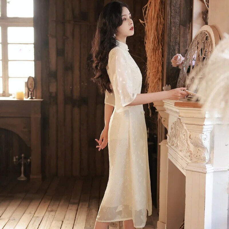 Cheongsam 2023 nowych kobiet wiosną i latem codzienna poprawa młodych dziewcząt odwrócony z długimi rękawami Audrey dopasowana sukienka sukienka koktajlowa