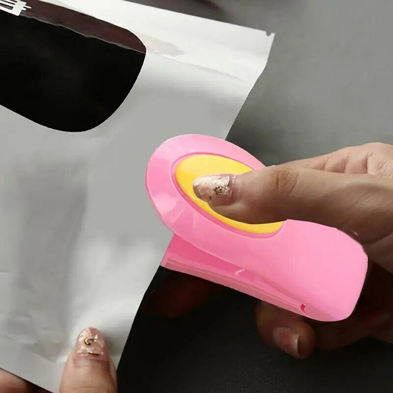 Portable Mini Handheld Hand Press Heating Snack Sealing Machine Heat Bag Sealer Packaging Plastics Bag Sealed Food Bag Sealer
