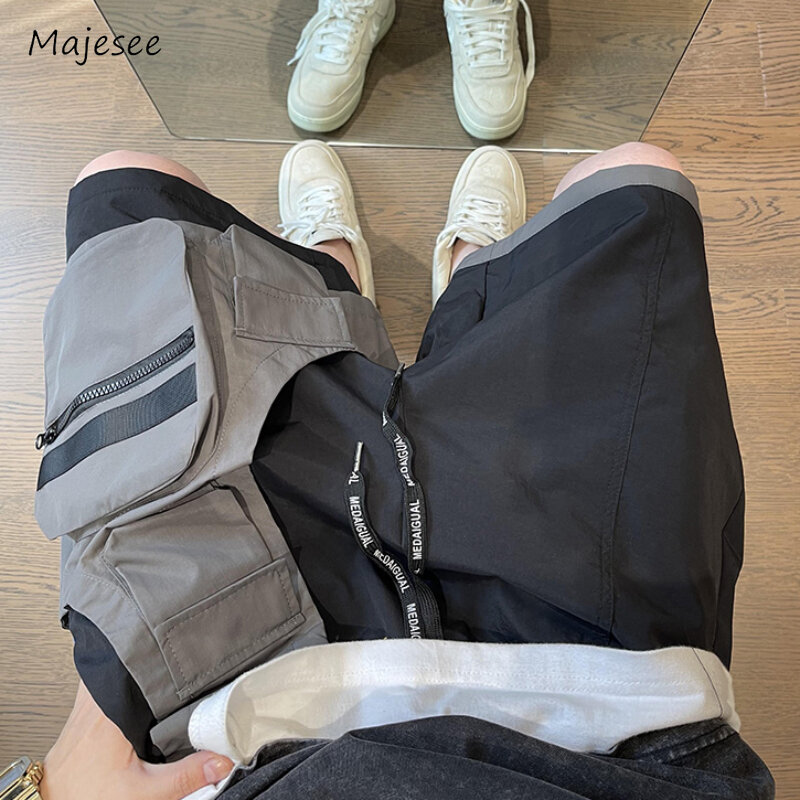 Celana pendek kargo pria warna kontras mode santai gaya Jepang musim panas tali serut bernapas luar longgar nyaman kepribadian Chic
