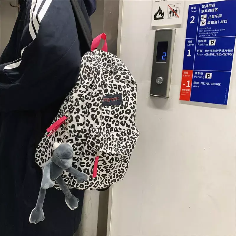 Mochila con estampado de leopardo para mujer, mochilas escolares con diseño de animales divertidos para niñas adolescentes, bolsos Kawaii con estampado de vaca blanca