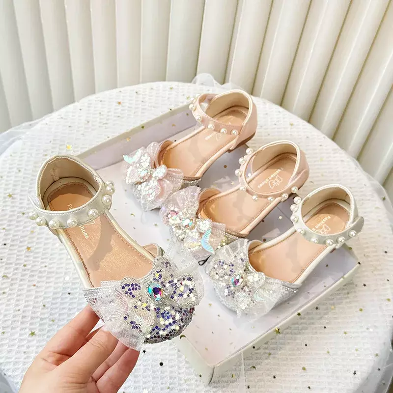 Dziewczęce sandały dziecięce kokardki z kryształu górskiego słodkie księżniczki modne buty na wesele dla dzieci eleganckie buty do tańca z cekiny z gwiazdek