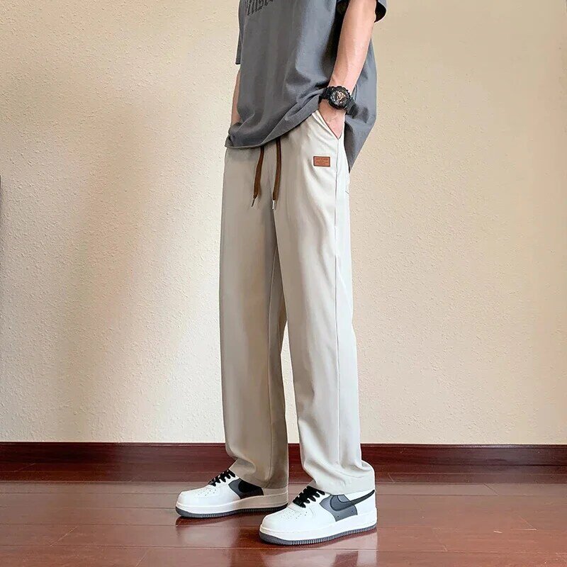 กางเกงขากว้างสไตล์เกาหลีกางเกงคาร์โก้สำหรับผู้ชายสีพื้นกางเกงสำหรับผู้ชายใหม่2024 Y2k