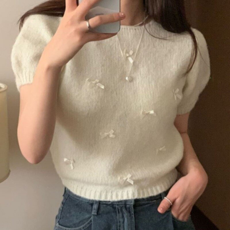 Wczesna wiosna nowa koreańska delikatna kokardka krótka sweter z rękawem słodka wersja miękka kleista dziergany sweter Top odzież damska