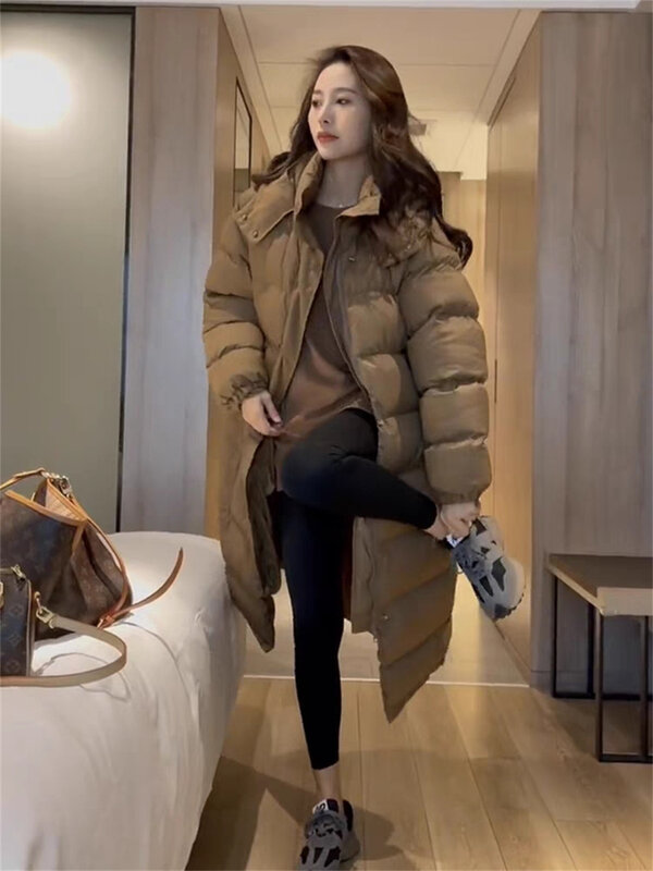 Jaket bertudung versi Korea wanita, jaket katun panjang Medium untuk musim dingin hangat longgar dan tebal serbaguna