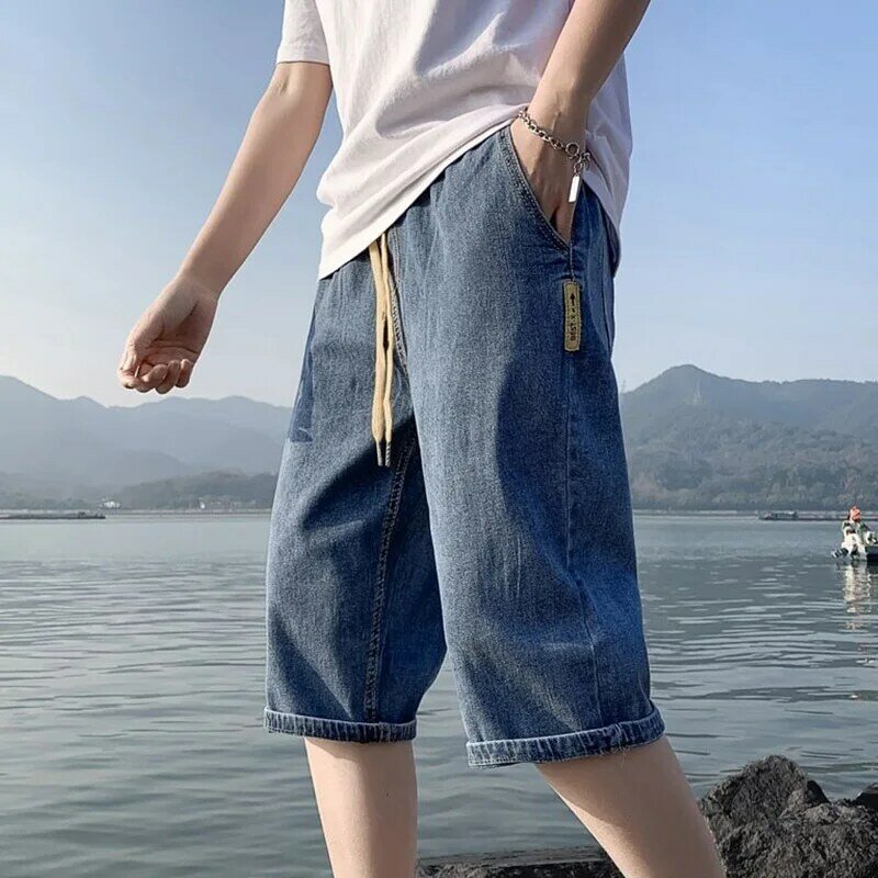 Calça jeans masculina, versão coreana, fina, solta, reta, com cordão, com elástico na cintura, grande, verão, moda, nova, 5XL