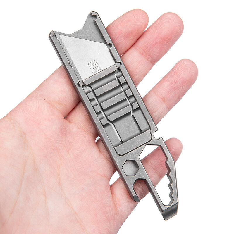 Coltello multiuso in lega di titanio strumento multifunzione EDC coltello a lama scorrevole per esterni portatile apribottiglie con righello in metallo