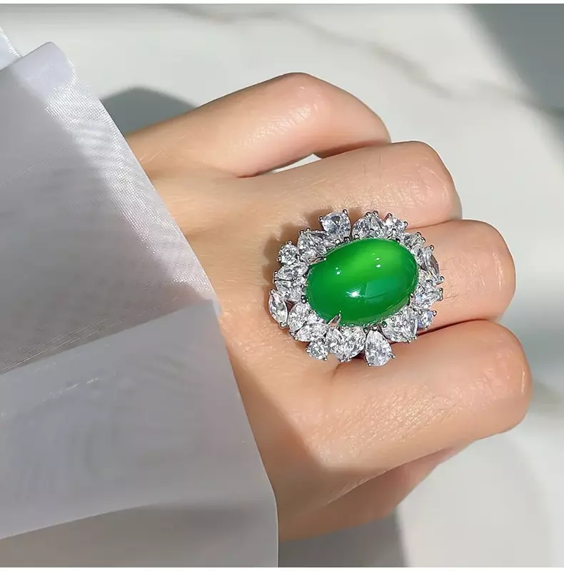 Desire Explosive Flash Ice Pigeon Egg Green Jade calcedonio Ring confronta 925 argento con alta fluorescenza