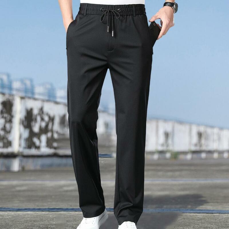 Loose Fit Men Pants Stretchy Men's Casual Pants with Pockets Fast-drying Straight-fit Trousers for Comfortable All-day Wear