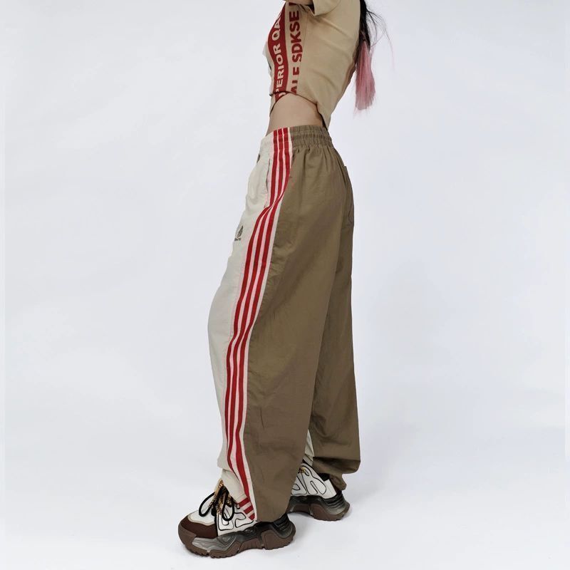 Modne w stylu Retro, patchworkowa paski sportowe damskie modne główna ulica luźne spodnie z szerokimi nogawkami, na co dzień z elastyczny, wysoki stanem