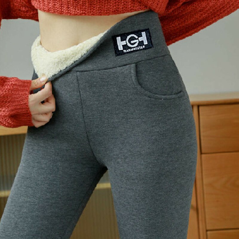 Nowe wyściełane i pogrubione legginsy damskie 2023 jesienno-zimowe ciepłe spodnie obcisłe rajstopy aksamitne spodnie damskie