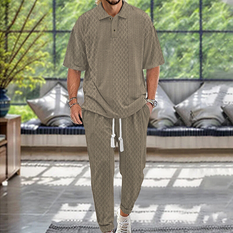 Setelan pakaian pria, setelan dua potong warna polos kasual baru musim panas mode longgar lengan pendek Polo dan celana