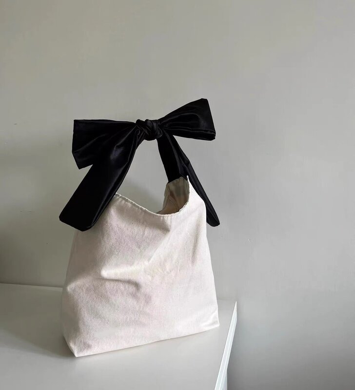 Borsa in tessuto minimalista a forma di fiocco, borsa per la spesa, borsa a tracolla