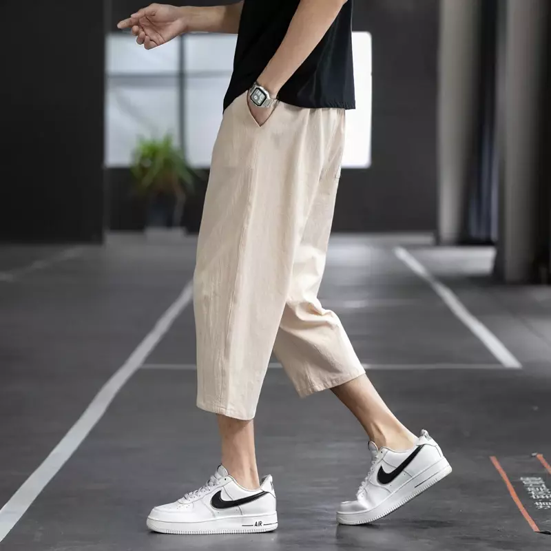 Pantaloni Casual estivi 2024 pantaloni larghi da uomo in cotone e lino selvaggio pantaloni dritti a nove punte di tendenza in stile coreano