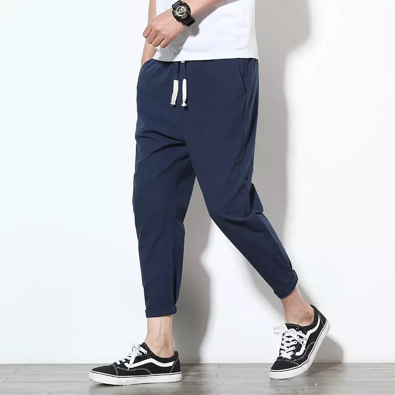 Solidny kolor spodnie męskie na co dzień lniane spodnie koreański styl wiele kolorów ze sznurkiem sportowe klasyczne spodnie dresowe męskie spodnie dresowe