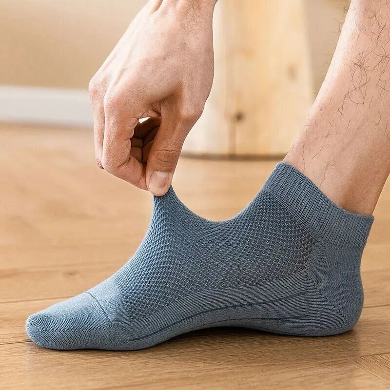 ถุงเท้าผู้ชายสไตล์ปกติท่อสั้นหุ้มข้อถุงน่องตาข่ายสีทึบฤดูร้อนธุรกิจคลาสสิกเคลื่อนไหวได้อย่างอิสระ