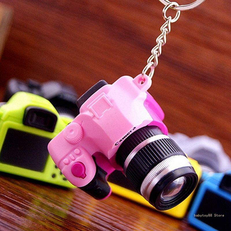 Y4UD Ciondolo luminoso per fotocamera digitale LED appeso per portachiavi giocattolo notturno ornamento regalo venditore per per
