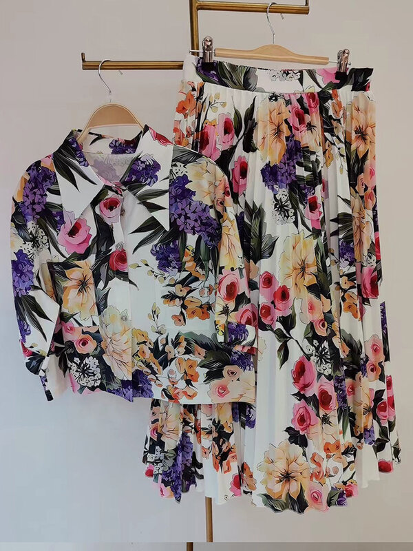 Wiosenna i letnia nowa drukowana koszula z krótkim rękawem bluzka z klapami + plisowana spódnica z wysokim stanem modny dwuczęściowy garnitur damski
