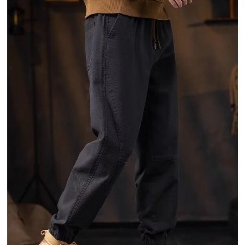 Pantalones elásticos de cintura alta para hombre, pantalón holgado de Color liso con bolsillos y cordón, estilo Harlan informal, primavera y otoño, novedad