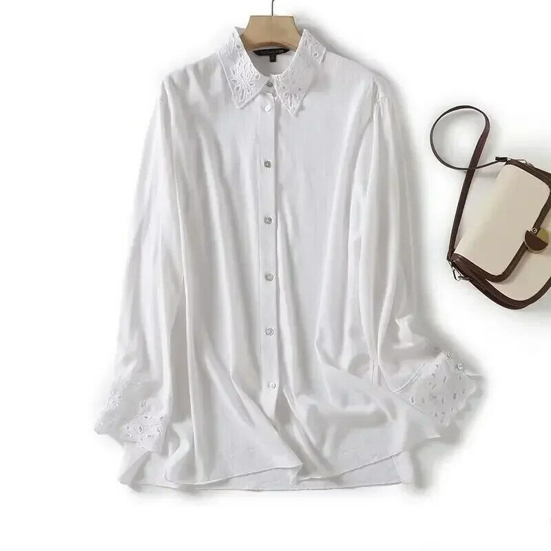 Damen Mode neue weiche und exquisite durchbrochene Stickerei Revers Bluse Retro Langarm Knopf Hemd schickes Top.