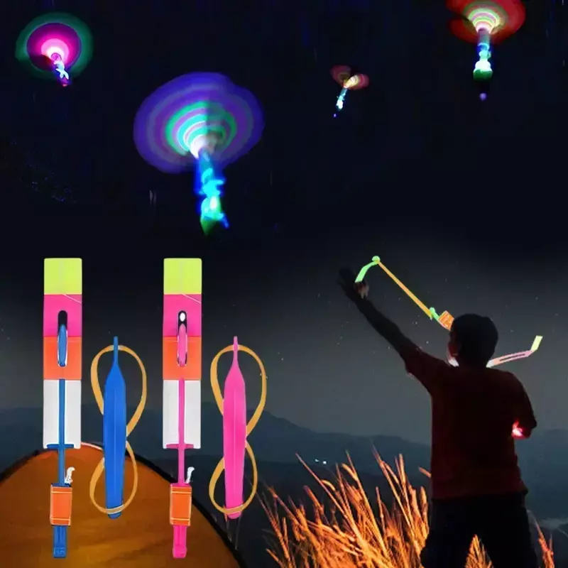 ของเล่นไฟเรืองแสงหลากสีสำหรับเด็กยางรัดลูกศรหนังสติ๊กเกมจรวดไฟ LED ส่องสว่างขึ้นยืดหยุ่นบินได้อย่างรวดเร็ว