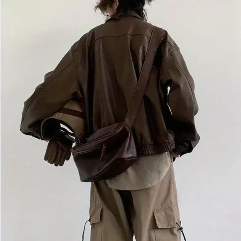 日本の女性のレトロな合成皮革のオートバイのジャケット,ダブル胸のポケット,ラペル,秋